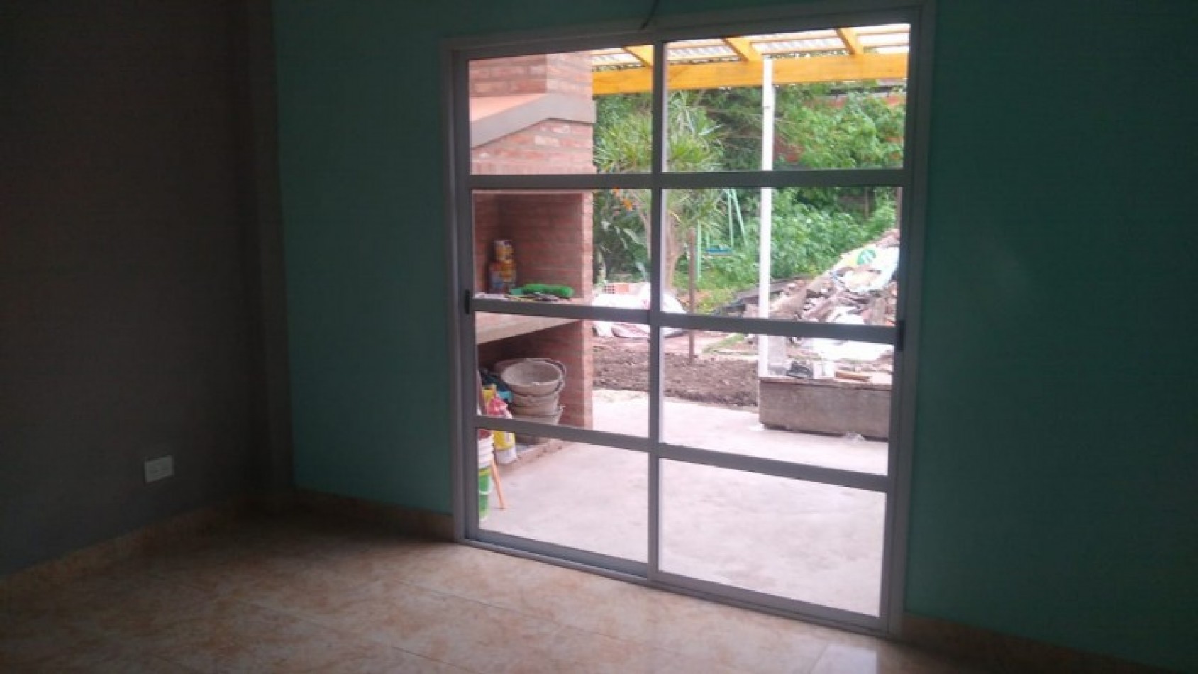 DEPARTAMENTO 2 AMBIENTES PLANTA BAJA   C/ PATIO Y PARRILLA